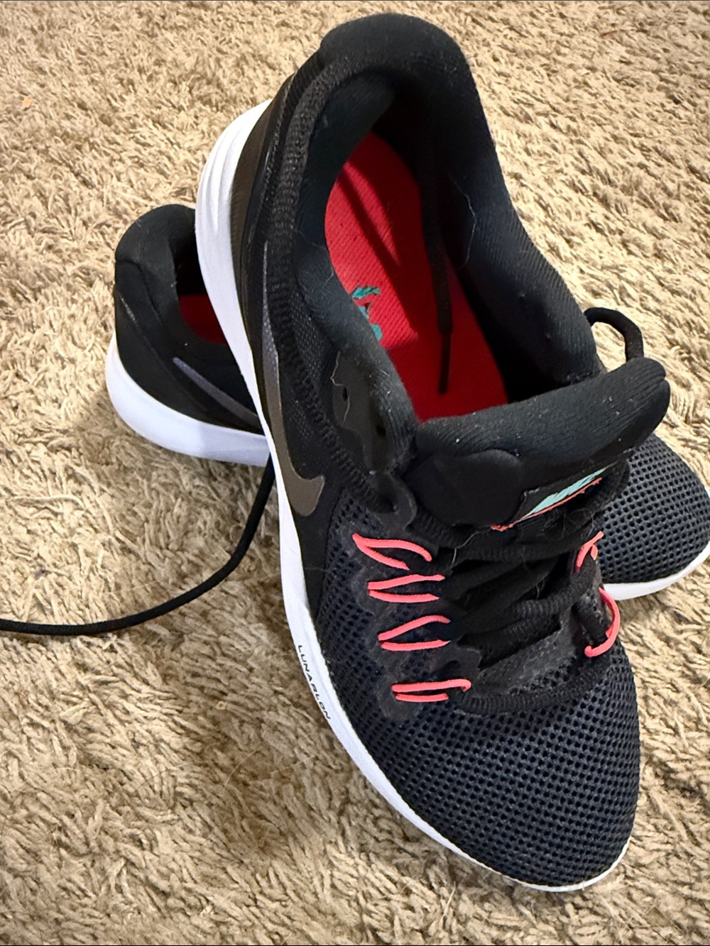 Nike Black Running Shoes with Pink and White Accents